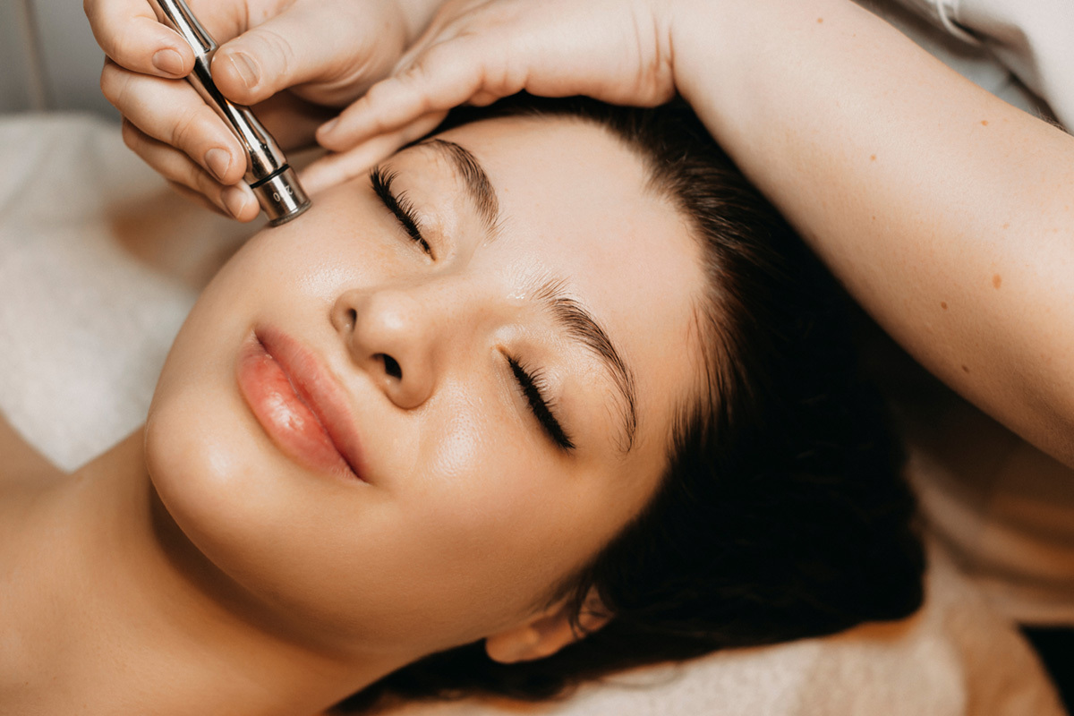 Beautiful woman having microdermabrasion non-invasive therapy